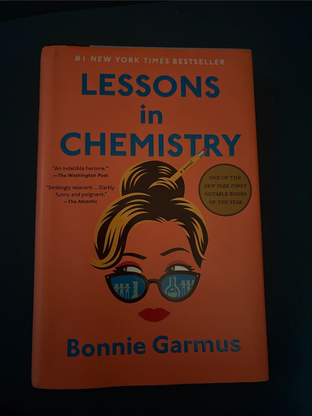 Lessons in Chemistry by Bonnie Garmus - Bright Orange Hardcover